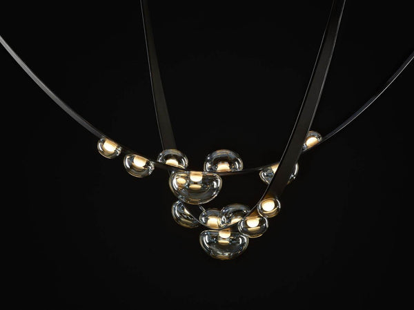 Lights of Scandinavia - Sash - Simple yet astonishing belt chandelier. Modern minimalistic design, 1.5mm stainless steel with a vacuum plated gold surface and polymer silicone lampshade. Long-life LED chip. Suitable for: Lobbies, bedrooms, living rooms, dining rooms, staircases, etc.
